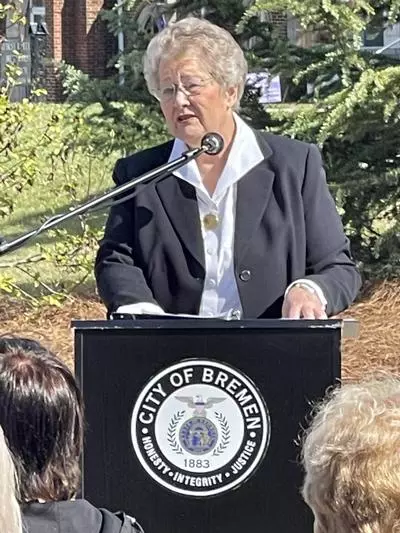 Mayor Sewell speaking at podium